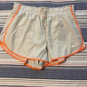 Brand new nike grey and orange running shorts